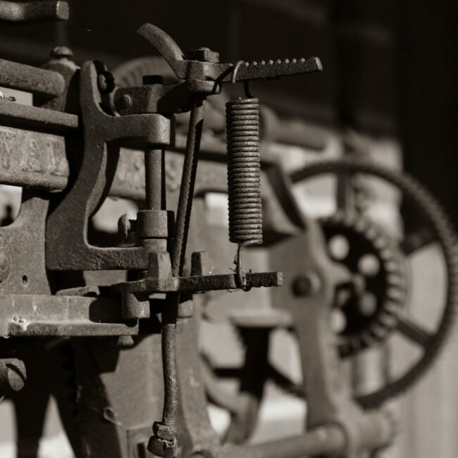 grayscale photography of industrial machine